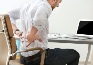 Lower Back Pain From Too Much Sitting? Here's How to Manage It